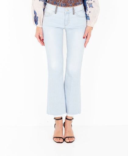 Jeans flare Liu Jo in denim elasticizzatoa vita bassa con glitter applicati e fondo effetto unfinished