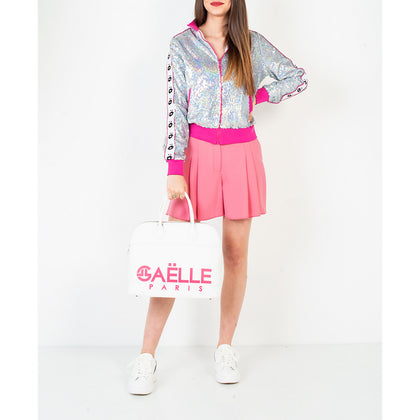 Outfit con il Giubbino Gaelle Paris con paillettes cangianti e profili in maglia a contrasto