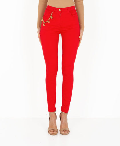 Jeans skinny rosso fuoco Elisabetta Franchi in denim  a vita alta con catena separabile in metallo dorato con charms safari